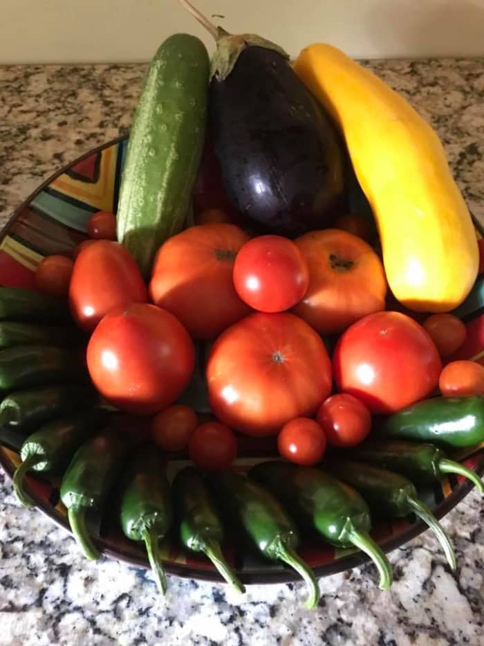 Natalie Nauer and her husband Tony work hard in their garden to produce a bountiful crop of delicious vegetables to eat in-season and can or freeze for the winter.