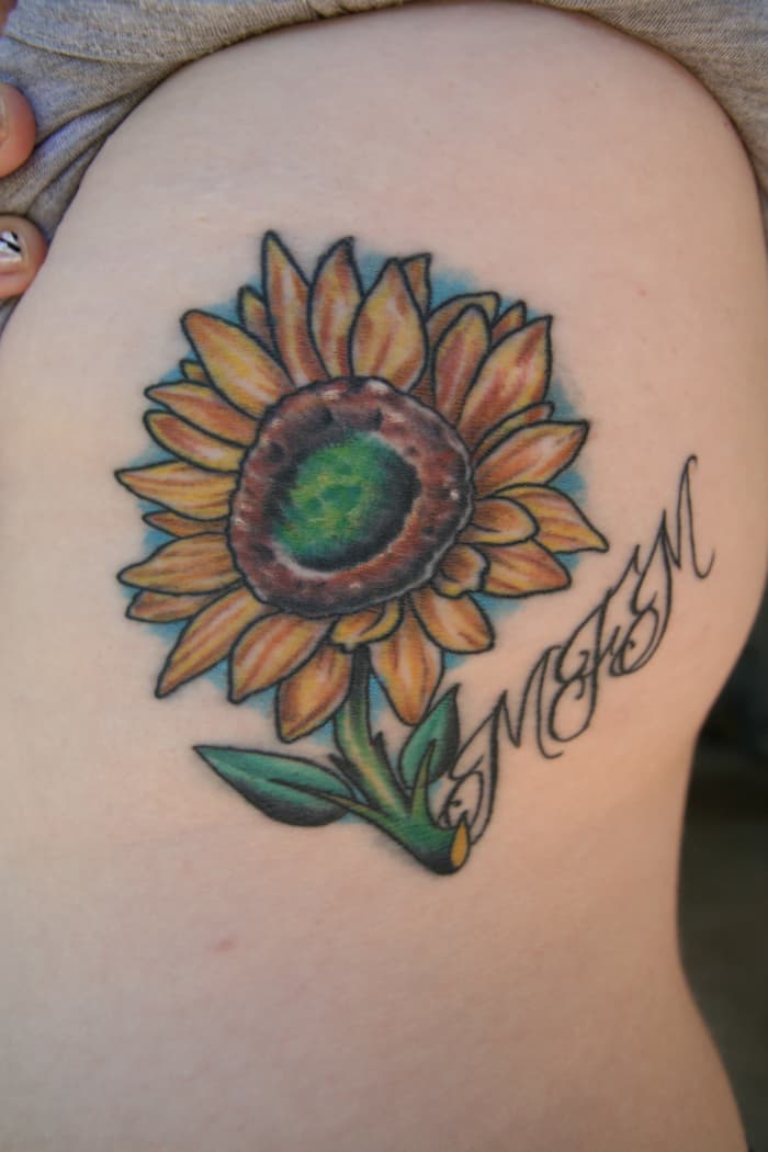 Sunflower Tattoo With a Phrase