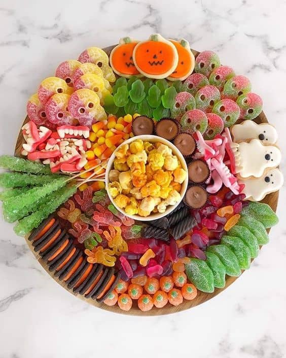 Candy Platter (I know this looks complex, but all of these snacks are store-bought! If you have your kids set it up, it won't look this nice, but they will have an absolute blast with it.)