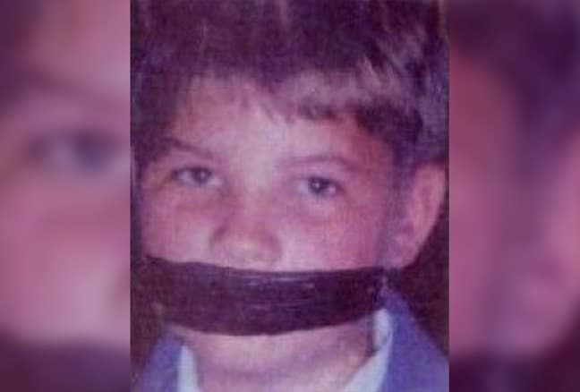 Photograph of a young boy with a drawing of a gag across his mouth was mailed to Port St. Joe Police Chief. Photo courtesy of National Center for Missing Adults.