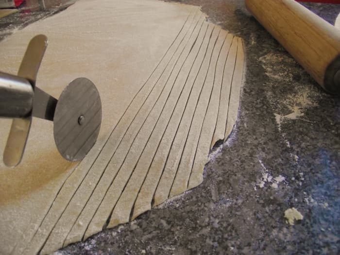 For tagliatelli, run a sharp knife or pizza cutter up the thinly rolled pasta to create strips, about 1cm in diameter. The strips can be as long as you like.