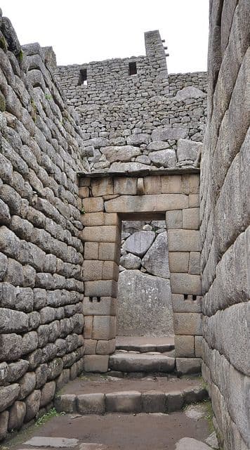 Inca architecture - The use of dry-stone walls (Ashlar) - Machu Picchu The central buildings of Machu Picchu use the classical Inca architectural style of polished dry-stone walls of regular shape.