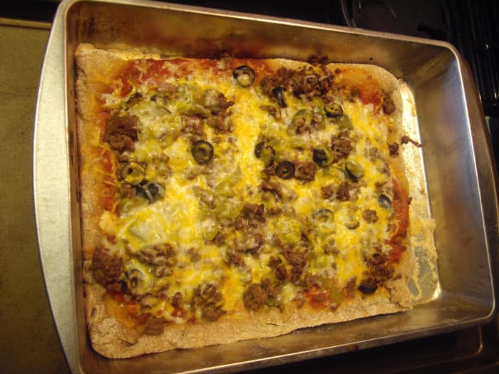 Here is the rectangular pizza I made the other day. I only have one pizza pan, so when I make two pizzas, I use my cookie sheet for the second. It works well!