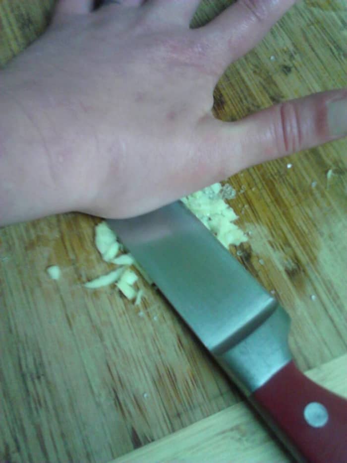 Secret weapon part 1: Use the knife blade to create a garlic sea salt flavor Infusion. Smash, grind, repeat.