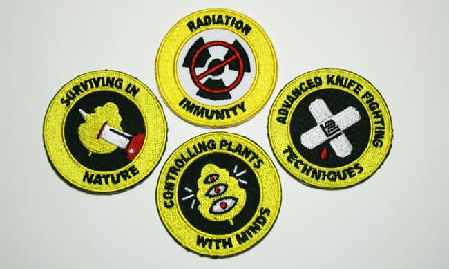 Get your Night Vale Girl Scout Patches! "Radiation Immunity", "Advanced Knife Fighting Techniques", "Surviving in Nature", and "Controlling Plants with Minds".