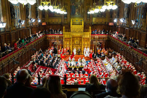 Dukes, viscounts, and other peers turn out in their finery for the state opening of Parliament that takes place in the unelected House of Lords.