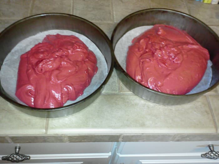 This recipe makes a thick batter, but it will spread out in the pans with a little help from you.
