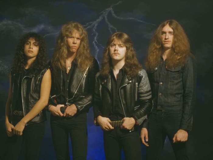 From left to right: Kirk Hammett, James Hetfield, Lars Ulrich, and Cliff Burton. Burton would unfortunately pass away the year after this photo was taken.