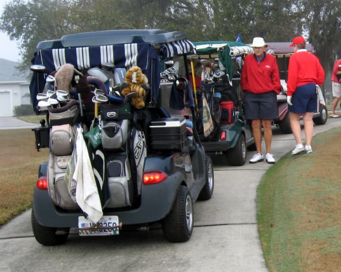 We put these on for 60 degrees or cooler. They don't have the enclosures rolled down on the carts so it isn't real cold on this day. They are wearing shorts so expect it to warm up later.