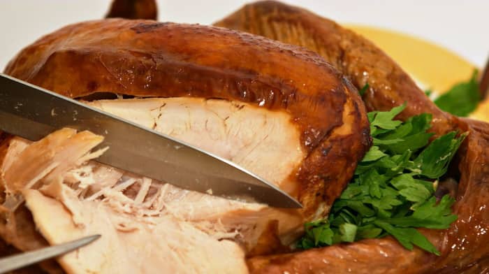 "Carving the turkey after giving "Thanks"...!" Then, preparing for the ceremonial "stuff your face"!