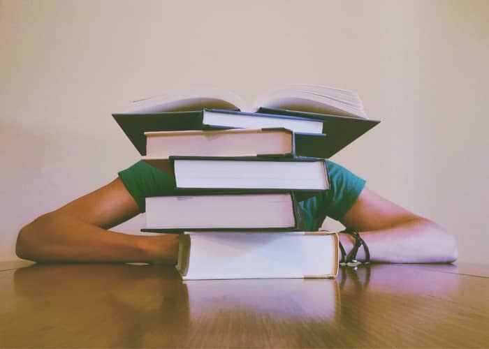 Being stuck at a study desk for hours reading legal textbooks and printouts of cases is an accurate depiction of a typical law student.