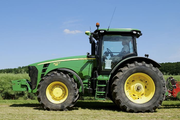 A John Deere tractor as large as the one that I purchased for almost free! Note the tractor in the photograph sadly lacks a cartoon image of Foghorn Leghorn. (My huge thanks to Uncle Sam and the Eleanor Sylvan & Brothers Bank for my new tractor.)