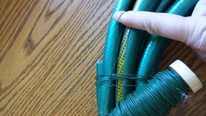 And remember, don't do as I show. Twist wire loop until it is hidden behind wreath. As I mentioned before I did adjust this, but didn't take a picture of it.