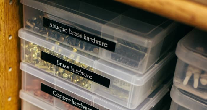 Stacking containers on a bookshelf or in a closet is an easy way to get all your embellishments organized