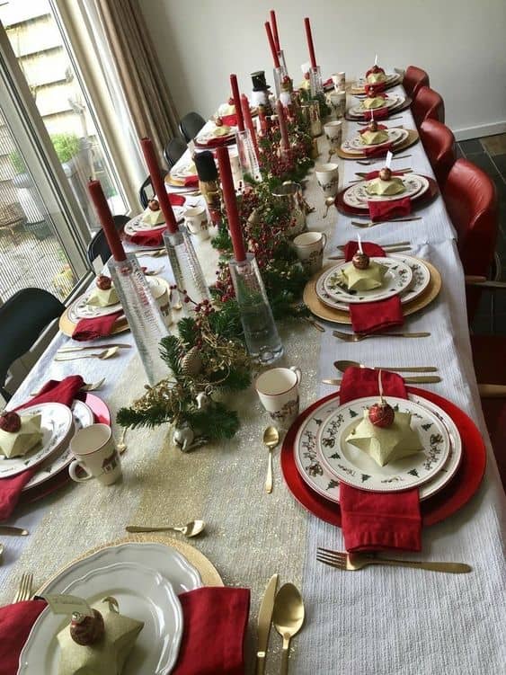 What could be more cheerful than this red and gold table setting? I love the fun favors on each plate!