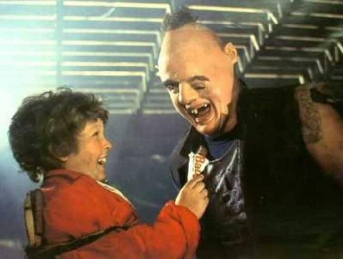 Hey, you guys! Former NFL player Matuszak (right) gives a charming performance as Sloth, a role which has endured in popular culture.