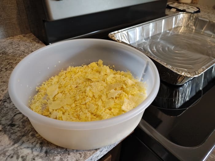 When rendering beeswax, previously rinsed cappings will be placed in cheesecloth, put into a foil pan with water, and baked until melted.