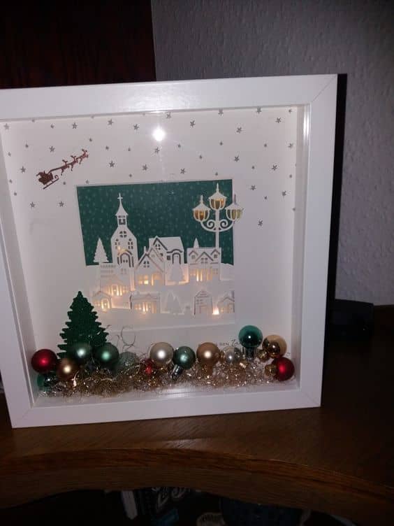 This is a subtle example of adding lights to your box. It looks so good in the windows of the cut-out houses!