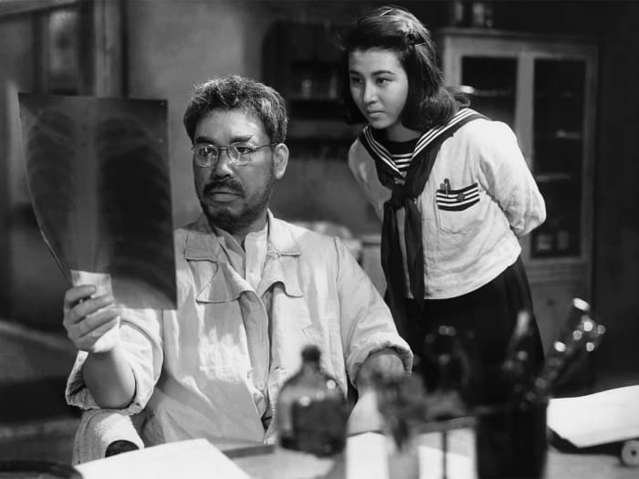 Shimura (left) as the alcoholic doctor struggling to hold on to his hope amid the rubble and decay of post-war Tokyo is equally superb.