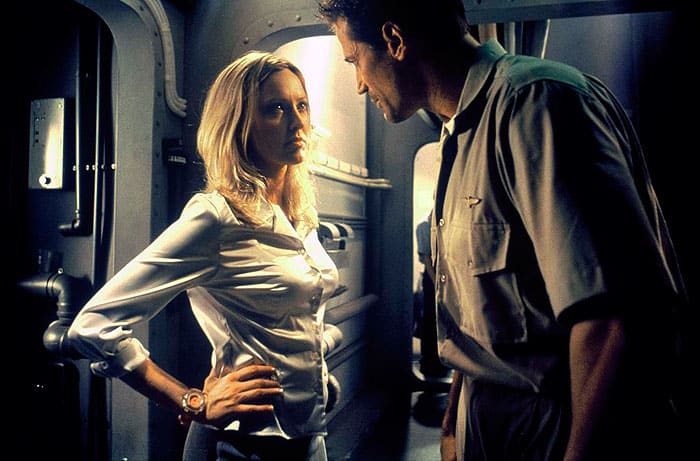 Dr. Lisa Finch (Carolyn Lowery) puts her foot down to Captain Jack Shaw (David Beecroft) about their rumored affair.