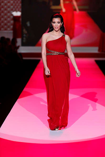 Kim Kardashian's lovely figure in a long red dress.