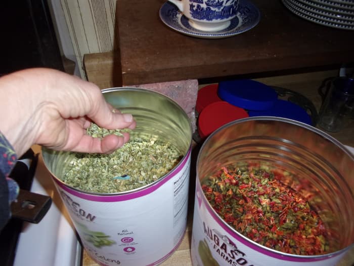 Add dehydrated veggies to your liking to the second pot. I'm using a large pinch each of celery, bell peppers and carrots.
