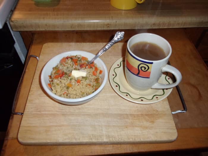 Put the noodles and veggies into a bowl and add a pat of butter. Eat your noodles with a fork and drink your broth!
