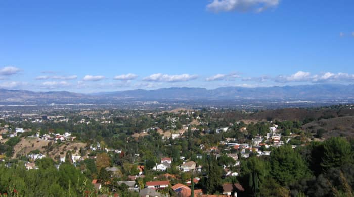 The San Fernando Valley, known as the Porn Capitol of the world, the dark shadow cast by the bright lights of Hollywood, on the other side of the rise.