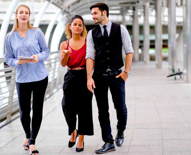 You should really think about your situation. He might clearly like the other woman, and you're a third wheel with unrequited feelings.
