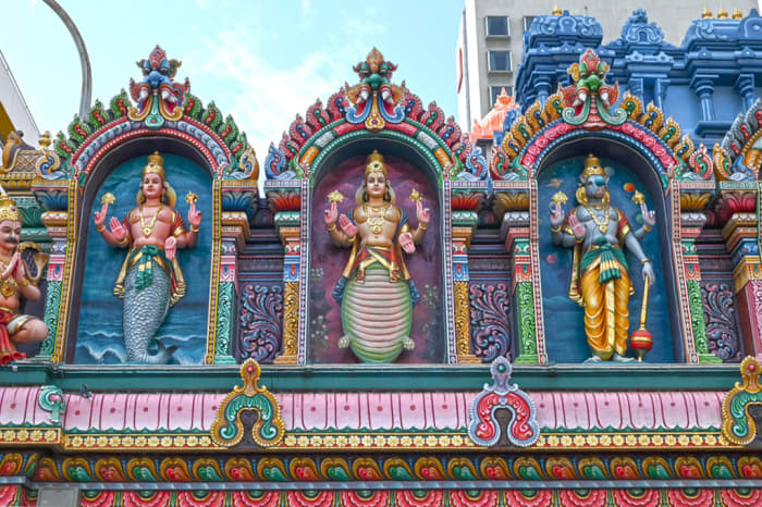 The first three avatars of Vishnu at a Hindu temple. Note how all three wields a disc-like object, i.e., the Sudarshana Chakra.