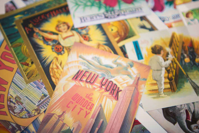 Vintage reproduction postcards. I used New York (my husband's home state), Halloween, and other various vintage images.