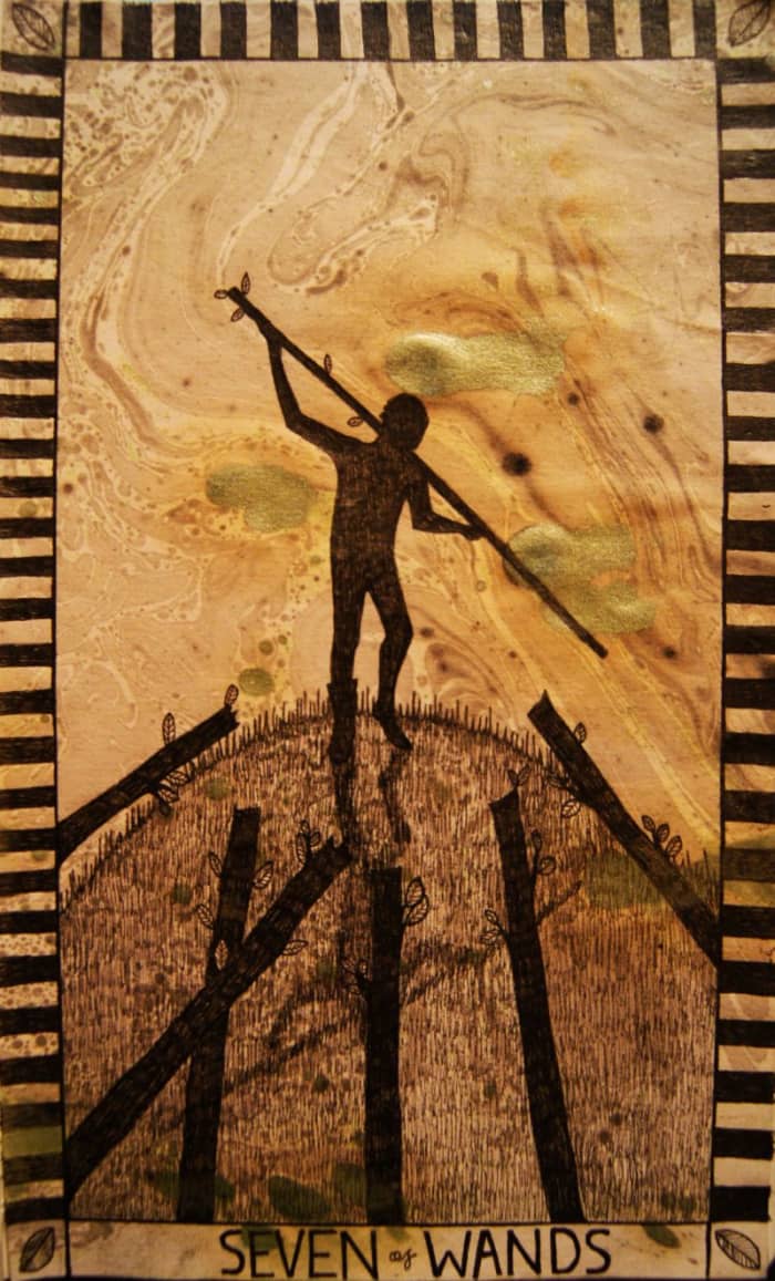 The Seven of Wands indicates imbalance. You must fight to keep the ground you've gained. Others see you or your community as having too much advantage. They want to steal from you. They're jealous of your good fortune.