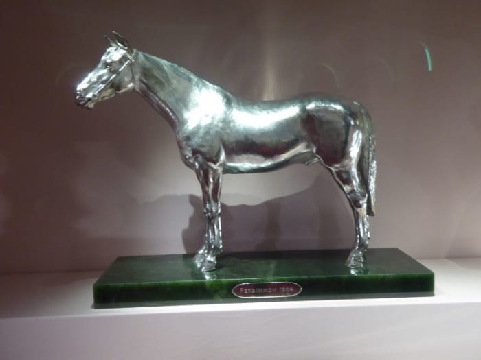 Statue of ‘Persimmon’ the racehorse 1908. Lent by Her Majesty The Queen. Image by Frances Spiegel (2021) with permission from the V&A. All Rights Reserved.