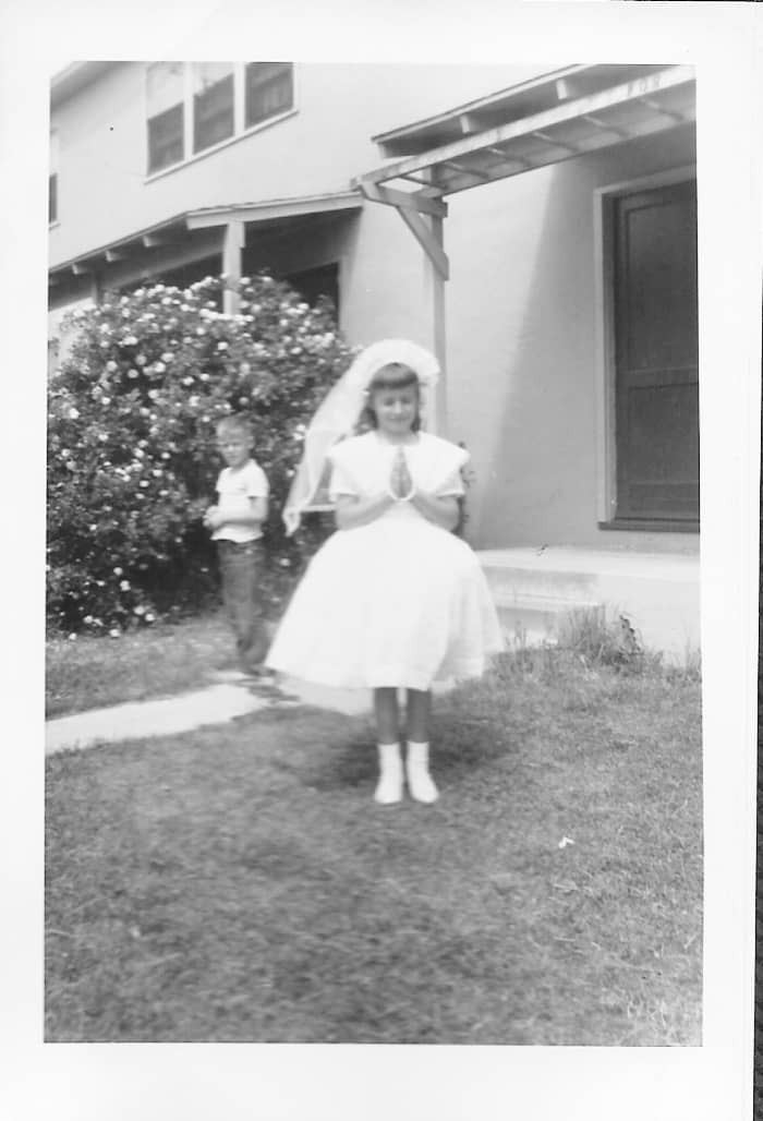 First Holy Communion: Posing for photos in front of my family's military housing unit in Komandorski Village, adjacent to Camp Parks military base.