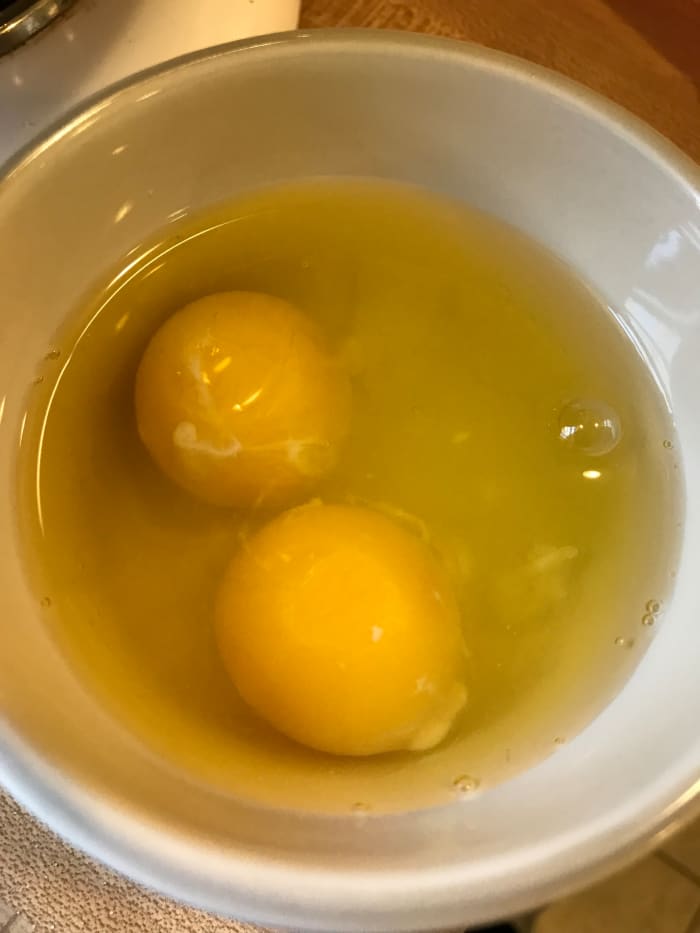 Use two whole eggs and an additional egg white. This will hep with the structure because of the added fat in the peanut butter.