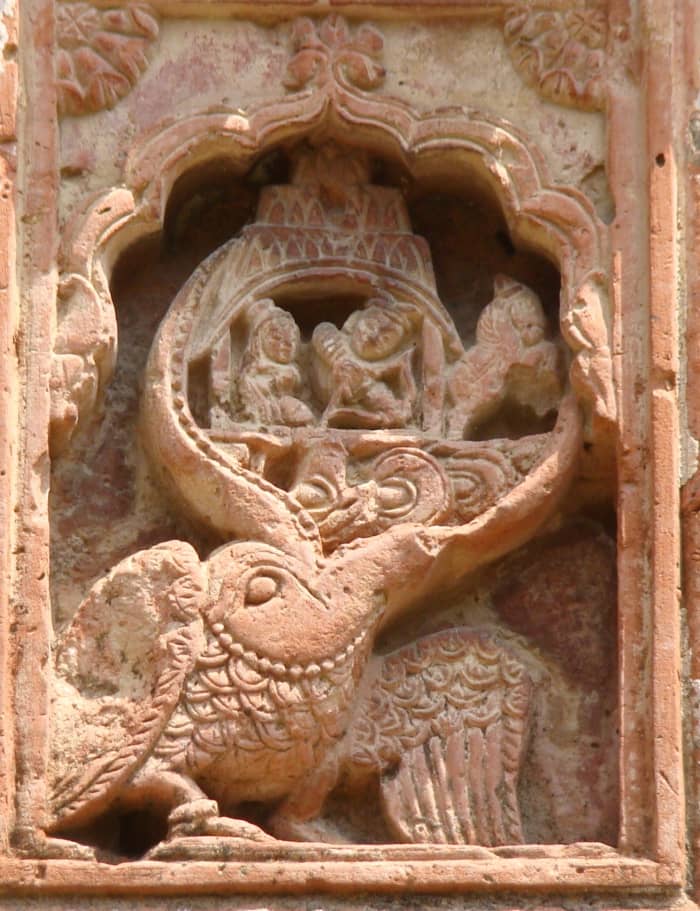 Suparsha, a huge bird attacking Ravana while absconding with Sita, the consort of Lord Rama - a scene from the epic Ramayana; terracotta