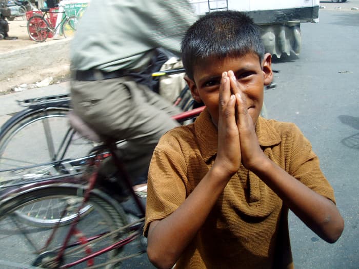 Notice how the background is blurred because it was moving, but the boy was not moving; therefore, he is very clear.