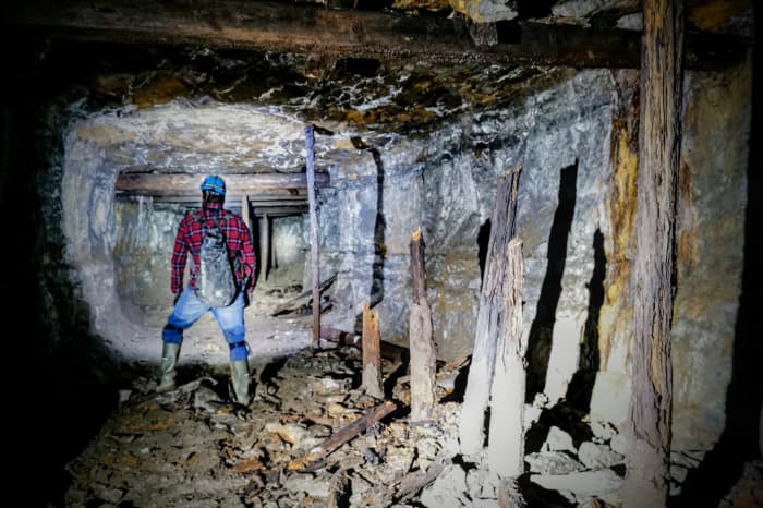 One of the smaller mine drift passages with some props still in place, albeit rotten from damp - a problem many faced when working in the drifts