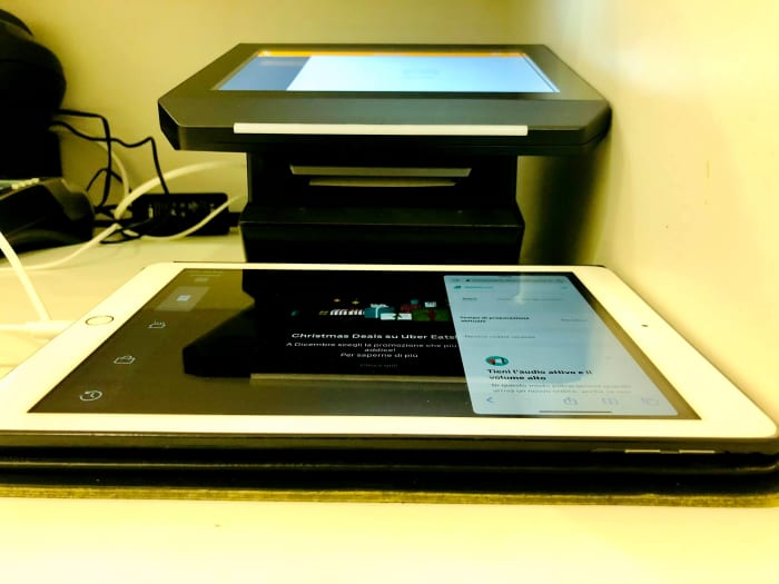 Two tablets used for food delivery. A good visibility in a popular food delivery service may be considered a form of indirect marketing.