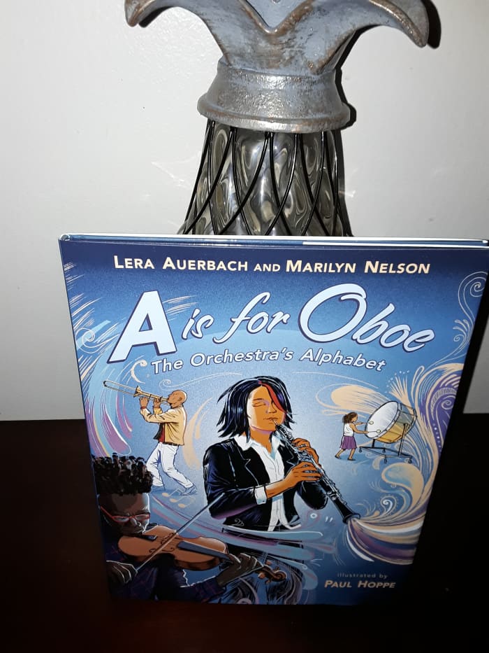 Beautifully illustrated picture book with creative descriptions of appreciating an orchestra