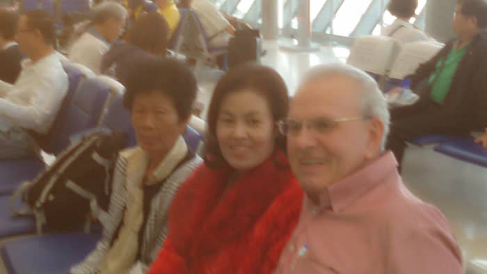 From left to right: mother-in-law, wife Suai, and author at Bangkok Suvarnabhumi Airport. Taken November 22, 2014