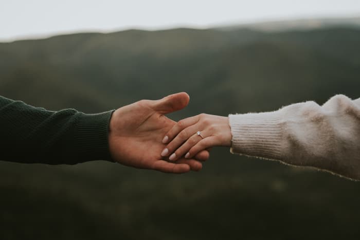 Women may still hold hands with their husbands at social functions even if the relationship is on the rocks.