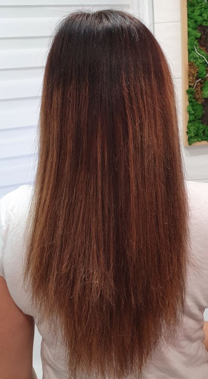 This is after I dried my hair with a Keratin mask on it. Still, you can see those significantly damaged parts, but immediately you can see less volume and frizz.