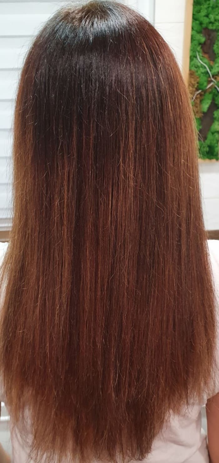 After washing the hair twice with shampoo and applying the conditioner provided. I have only blowdried my hair, no ironing necessary.