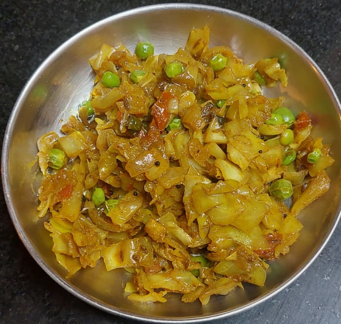 Spicy and tasty cabbage peas stir-fry is ready. Serve hot with any Indian bread like chapati, paratha or phulka. Goes well with rasam rice, too.