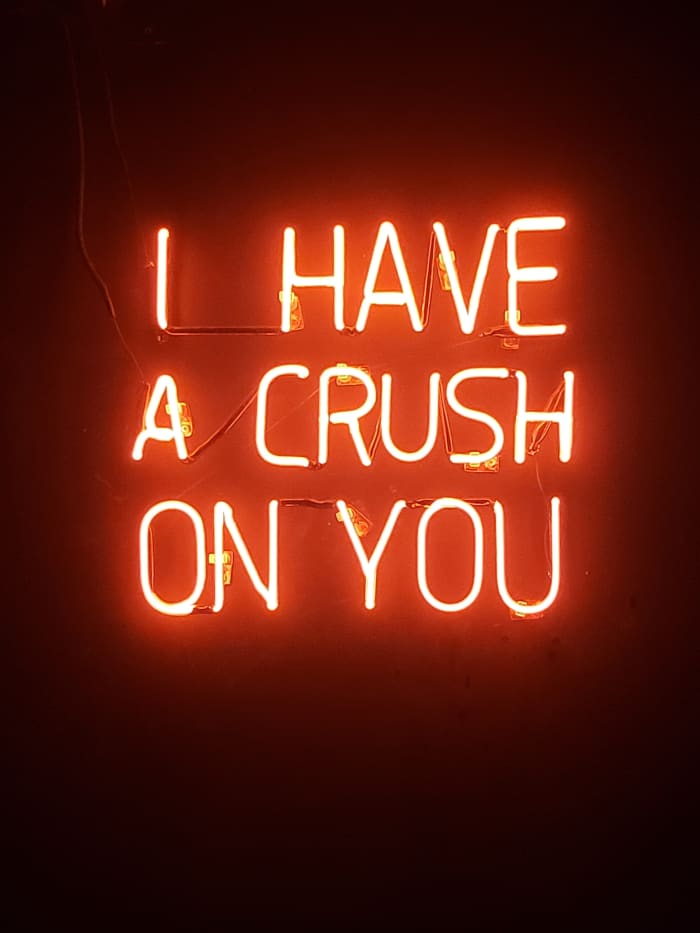 You're probably not ready to reveal your crush in neon lights, but asking a few deep questions is a good way to start!