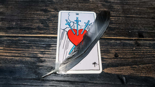 The Three of Swords foretells a serious misfortune. The card is most commonly associated with breakups.