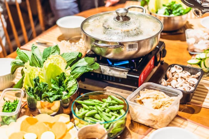 Chinese-style hot pot is known as "steamboat" in Singapore. Many Chinese families consider steamboat to be classic reunion dinner cuisine.