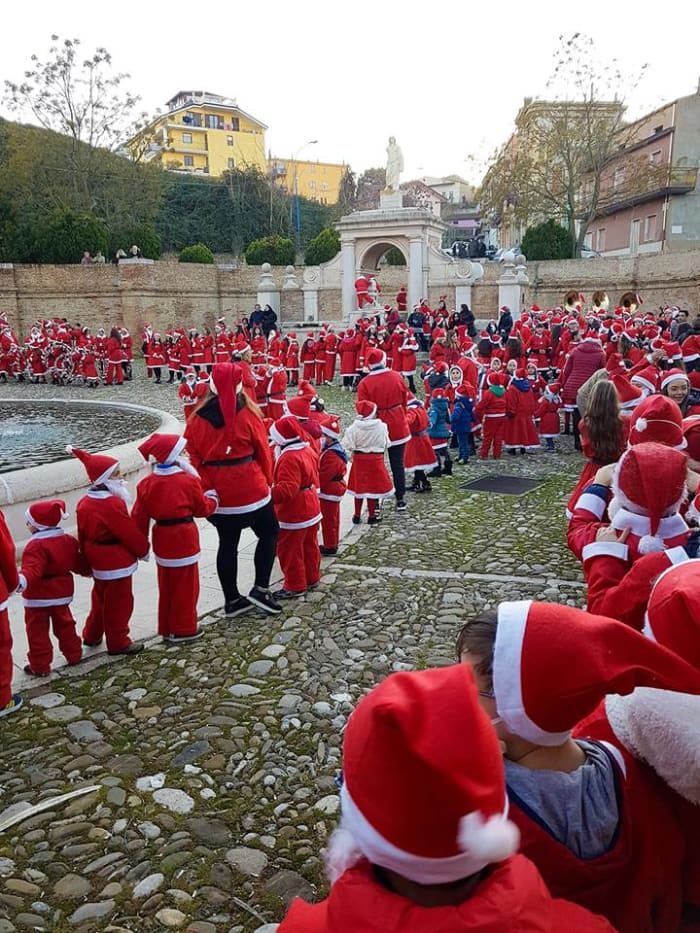 This must be the oldest public place in Genzano that everybody knows. Today they still use it to celebrate a feast, mixing the old with the new. Colourful photo, and it reminds me how streets were paved the old way.