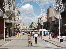 This is a special feast of the madonna, Maria Santissima delle Grazie in Genzano. It happens once a year, the round arches you see are erected for special lighting during the feast.